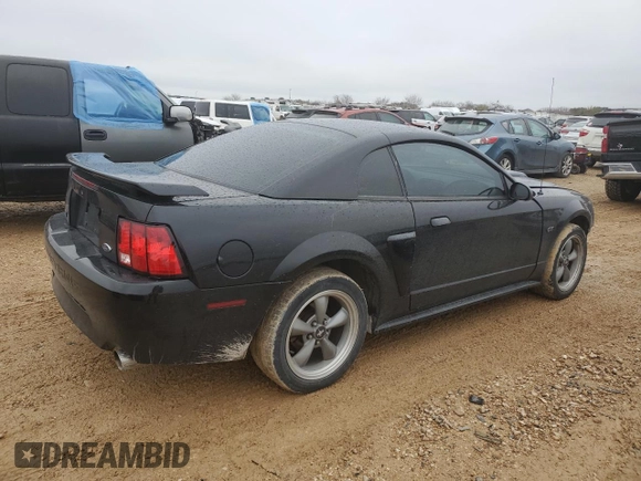 2002 Ford Mustang GT Deluxe with VIN 1FAFP42X42F214888, listed as a Copart auction lot 44379755 with 77,207 mi miles and Salvage Title. Bid and sale history available at carsss.com. Image 3.