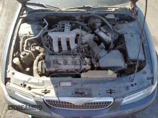 1997 Mazda Millenia z VIN JM1TA2213V1308406, wystawiony jako Copart lot #74141674 z przebiegiem 205 115 mil mil oraz Tytuł czysty. Historia ofert i sprzedaży dostępna na DreamBid. Obrazek 11.