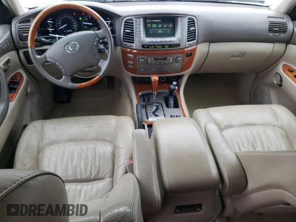 2004 Lexus LX 470 with VIN JTJHT00W343547828, listed as a Copart auction lot 48982045 with 196,877 mi miles and Salvage Title. Bid and sale history available at DreamBid. Image 8.