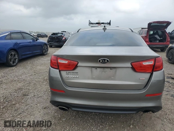 2015 Kia Optima LX z VIN 5XXGM4A71FG424462, wystawiony jako Copart lot #51968415 z przebiegiem 99 624 mil mil oraz Szkoda całkowita • Salvage title. Historia ofert i sprzedaży dostępna na DreamBid. Obrazek 6.