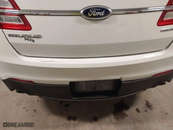2014 Ford Taurus SE with VIN 1FAHP2D89EG178858, listed as a IAAI auction lot 40853995 with 136606 miles. Bid and sale history available at carsss.com. Image 19.