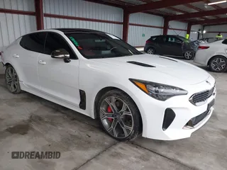 2019 Kia Stinger GT1 with VIN KNAE45LC4K6045047, listed as a IAAI auction lot 41489423 with 75,845 mi miles. Bid and sale history available at carsss.com. Image 1.