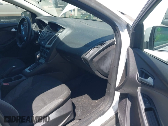 2013 Ford Focus SE z VIN 1FADP3F25DL290446, wystawiony jako IAAI lot #42520571 z przebiegiem 158 020 mil mil oraz . Historia ofert i sprzedaży dostępna na DreamBid. Obrazek 5.