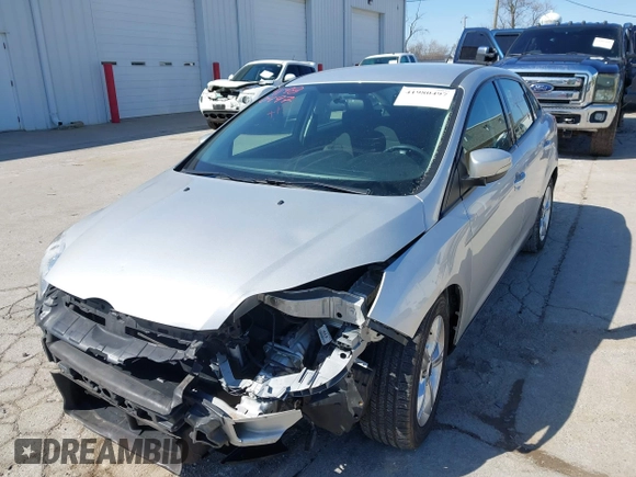 2013 Ford Focus SE z VIN 1FADP3F23DL306241, wystawiony jako IAAI lot #41980497 z przebiegiem 63 313 mil mil oraz . Historia ofert i sprzedaży dostępna na DreamBid. Obrazek 19.