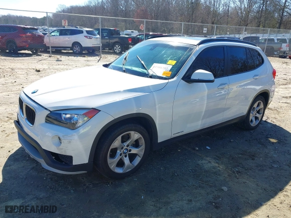 2015 BMW X1 sDrive28i with VIN WBAVM1C53FV317173, listed as a IAAI auction lot 41586385 with 146,068 mi miles. Bid and sale history available at carsss.com. Image 17.