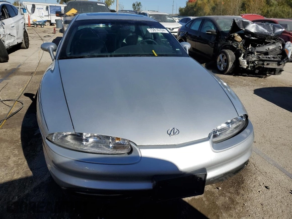 1999 Oldsmobile Aurora with VIN 1G3GR62C7X4109461, listed as a Copart auction lot 75916764 with 107,690 mi miles and Salvage Title. Bid and sale history available at DreamBid. Image 5.