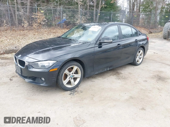 2013 BMW 3 Series 328i xDrive with VIN WBA3B5C5XDF597184, listed as a IAAI auction lot 42060785 with 205,559 mi miles. Bid and sale history available at carsss.com. Image 2.