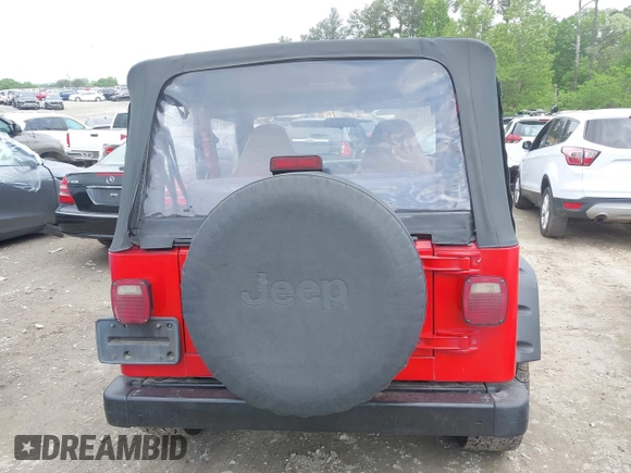 1999 Jeep Wrangler SE z VIN 1J4FY29P5XP487111, wystawiony jako IAAI lot #42125867 z przebiegiem 156 804 mil mil oraz . Historia ofert i sprzedaży dostępna na DreamBid. Obrazek 16.