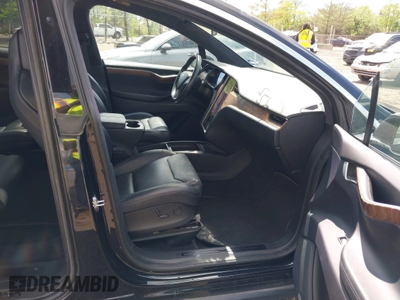 2019 Tesla Model X 75D with VIN 5YJXCBE21KF180203, listed as a IAAI auction lot 42190255 with 114,294 mi miles and . Bid and sale history available at DreamBid. Image 5.