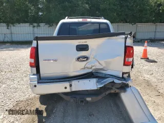 2010 Ford Explorer Sport Trac Limited с VIN 1FMEU3DEXAUA00384, выставлен на аукционе Copart как лот 62176895 с пробегом 114 115 миль миль и Списание • Salvage title. История ставок и продаж доступна на DreamBid. Изображение 6.