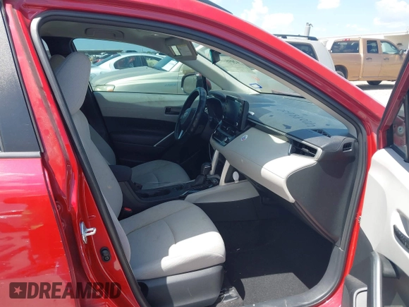 2022 Toyota Corolla Cross LE with VIN 7MUCAAAG1NV004645, listed as a IAAI auction lot 42098602 with 122,135 mi miles and . Bid and sale history available at DreamBid. Image 5.