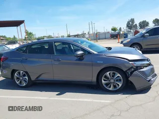 2018 Honda Clarity Touring z VIN JHMZC5F33JC021811, wystawiony jako IAAI lot #42272808 z przebiegiem 82 414 mil mil oraz . Historia ofert i sprzedaży dostępna na DreamBid. Obrazek 13.