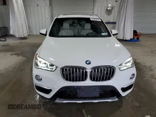 2018 BMW X1 xDrive28i z VIN WBXHT3C31J3H33391, wystawiony jako Copart lot #47849675 z przebiegiem 73 108 mil mil oraz Szkody całkowita. Historia ofert i sprzedaży dostępna na DreamBid. Obrazek 5.
