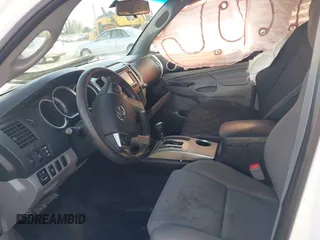 2014 Toyota Tacoma PreRunner with VIN 3TMJU4GN7EM158230, listed as a IAAI auction lot 40010521 with 145,185 mi miles. Bid and sale history available at carsss.com. Image 5.