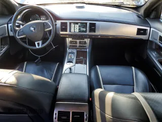 2015 Jaguar XF V6 Portfolio with VIN SAJWA0F7XF8U51105, listed as a Copart auction lot 82865814 with 62,807 mi miles and Salvage Title. Bid and sale history available at carsss.com. Image 8.