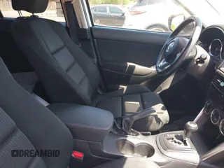 2013 Mazda CX-5 Touring with VIN JM3KE4CE8D0156843, listed as a IAAI auction lot 42018321 with 143,396 mi miles. Bid and sale history available at carsss.com. Image 5.