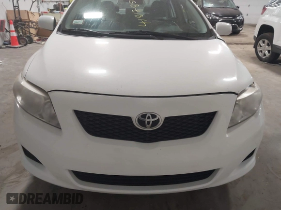 2010 Toyota Corolla z VIN 2T1BU4EE7AC520406, wystawiony jako IAAI lot #41817852 z przebiegiem 127 653 mil mil oraz . Historia ofert i sprzedaży dostępna na DreamBid. Obrazek 12.