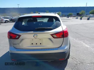 2017 Nissan Rogue SV with VIN JN1BJ1CP7HW017295, listed as a IAAI auction lot 42321408 with 84,430 mi miles and . Bid and sale history available at DreamBid. Image 16.
