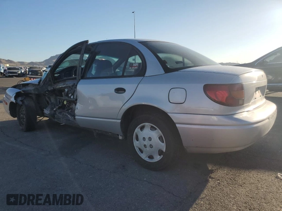2000 Saturn SL with VIN 1G8ZH5281YZ242734, listed as a Copart auction lot 57433915 with Not provided miles and Salvage title. Bid and sale history available at DreamBid. Image 2.