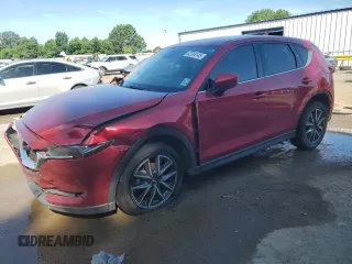 2018 Mazda CX-5 Grand Touring с VIN JM3KFADM9J0398036, выставлен на аукционе Copart как лот 62284145 с пробегом 118 827 миль миль и Списание • Salvage title. История ставок и продаж доступна на DreamBid. Изображение 1.