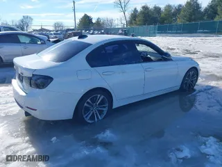 2014 BMW 3 Series 335i xDrive with VIN WBA3B9G5XENR91793, listed as a IAAI auction lot 41373042 with 138,560 mi miles. Bid and sale history available at carsss.com. Image 4.