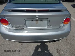 2003 Nissan Maxima SE with VIN JN1DA31D33T513282, listed as a IAAI auction lot 42289710 with 343,973 mi miles and . Bid and sale history available at DreamBid. Image 15.