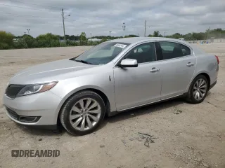 2015 Lincoln MKS with VIN 1LNHL9DK2FG607216, listed as a Copart auction lot 66553344 with 113,103 mi miles and Salvage Title. Bid and sale history available at carsss.com. Image 1.