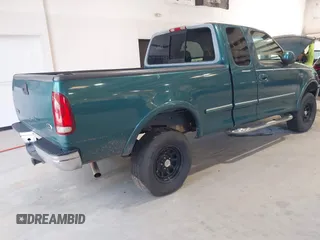 1998 Ford F-150 XL with VIN 1FTRX18L5WNB23716, listed as a IAAI auction lot 42579695 with 305,363 mi miles and . Bid and sale history available at DreamBid. Image 4.