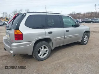 2004 GMC Envoy SLE with VIN 1GKDT13S142219365, listed as a IAAI auction lot 41612594 with 72,292 mi miles. Bid and sale history available at carsss.com. Image 4.