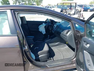 2018 Kia Forte LX with VIN 3KPFK4A70JE217385, listed as a IAAI auction lot 39955381 with 99,060 mi miles. Bid and sale history available at carsss.com. Image 5.
