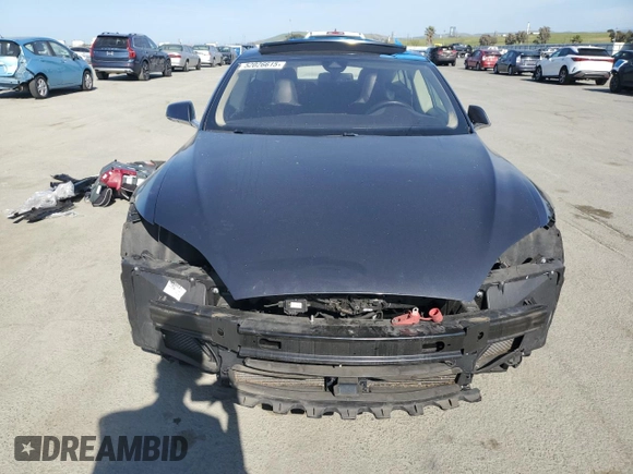 2015 Tesla Model S 85D with VIN 5YJSA1S2XFF092318, listed as a Copart auction lot 52026615 with 78,729 mi miles and Salvage Title. Bid and sale history available at carsss.com. Image 5.