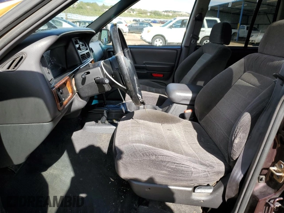 1997 Jeep Grand Cherokee Laredo with VIN 1J4GZ58S1VC747713, listed as a Copart auction lot 55290275 with 159,846 mi miles and Salvage title. Bid and sale history available at DreamBid. Image 7.