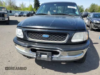 1997 Ford F-150 XL with VIN 1FTDX1863VKB12606, listed as a Copart auction lot 54605395 with 216,970 mi miles and Clean Title. Bid and sale history available at carsss.com. Image 5.