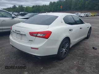 2014 Maserati Ghibli S Q4 with VIN ZAM57RTA6E1090505, listed as a IAAI auction lot 42326212 with 73,743 mi miles and . Bid and sale history available at DreamBid. Image 4.