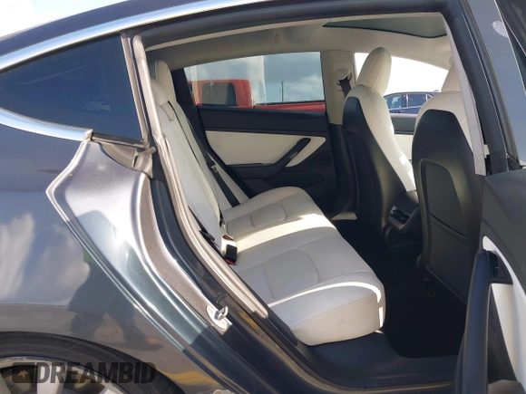 2020 Tesla Model 3 Standard Range Plus with VIN 5YJ3E1EA0LF744046, listed as a IAAI auction lot 41939894 with 102,576 mi miles. Bid and sale history available at carsss.com. Image 8.