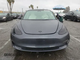 2023 Tesla Model 3 with VIN 5YJ3E1EA5PF640805, listed as a Copart auction lot 48389265 with 28,193 mi miles and Salvage title. Bid and sale history available at DreamBid. Image 5.