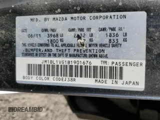 2011 Mazda Mazda3 i Touring with VIN JM1BL1VG1B1901676, listed as a Copart auction lot 48125475 with 106,613 mi miles and Salvage Title. Bid and sale history available at carsss.com. Image 14.