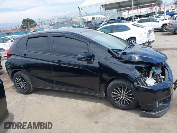 2017 Honda Fit LX with VIN JHMGK5H51HS012176, listed as a IAAI auction lot 42011477 with 91,894 mi miles. Bid and sale history available at carsss.com. Image 14.