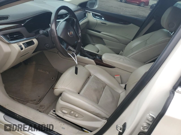 2014 Cadillac XTS Luxury with VIN 2G61M5S37E9190425, listed as a Copart auction lot 79697794 with 182,566 mi miles and Salvage Title. Bid and sale history available at DreamBid. Image 7.