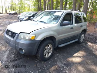 2007 Ford Escape XLT with VIN 1FMCU93167KA51832, listed as a IAAI auction lot 42115125 with 148,584 mi miles. Bid and sale history available at carsss.com. Image 2.