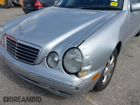 2002 Mercedes-Benz E-Class with VIN WDBJF82J02X070968, listed as a IAAI auction lot 41352216 with 91,704 mi miles. Bid and sale history available at carsss.com. Image 6.