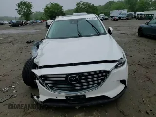 2021 Mazda CX-9 Touring with VIN JM3TCBCY1M0517709, listed as a Copart auction lot 57624945 with 64,081 mi miles and Salvage title. Bid and sale history available at DreamBid. Image 14.