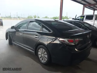 2016 Hyundai Sonata Hybrid SE with VIN KMHE24L12GA037983, listed as a IAAI auction lot 42078321 with 113,998 mi miles. Bid and sale history available at carsss.com. Image 3.
