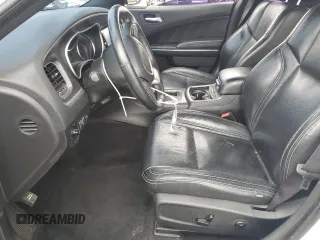 2015 Dodge Charger SXT z VIN 2C3CDXHG7FH721601, wystawiony jako Copart lot #58253925 z przebiegiem 123 004 mil mil oraz Szkoda całkowita • Salvage title. Historia ofert i sprzedaży dostępna na DreamBid. Obrazek 7.