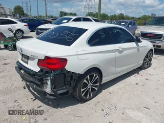 2020 BMW 2 Series 230i with VIN WBA2J1C05L7E54523, listed as a IAAI auction lot 42013928 with 43,659 mi miles. Bid and sale history available at carsss.com. Image 4.