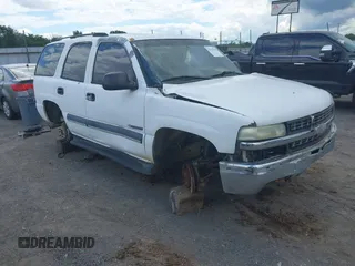 2003 Chevrolet Tahoe LS z VIN 1GNEC13V23R317327, wystawiony jako IAAI lot #42183565 z przebiegiem 267 057 mil mil oraz . Historia ofert i sprzedaży dostępna na DreamBid. Obrazek 1.