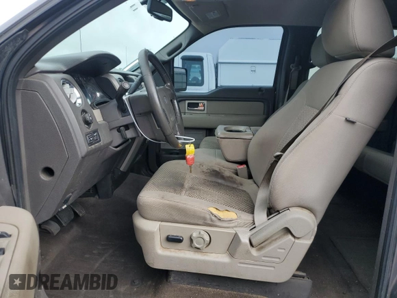 2010 Ford F-150 XL with VIN 1FTFW1EV1AFD48049, listed as a Copart auction lot 58571135 with 189,439 mi miles and Salvage title. Bid and sale history available at DreamBid. Image 7.