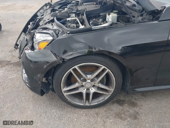2017 Mercedes-Benz E-Class E 400 with VIN WDDKJ6HBXHF353634, listed as a IAAI auction lot 41203314 with 106,531 mi miles. Bid and sale history available at carsss.com. Image 22.