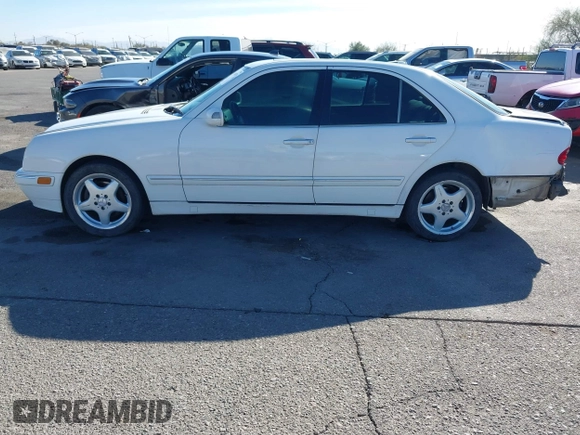 2002 Mercedes-Benz E-Class with VIN WDBJF82J62X076581, listed as a IAAI auction lot 41194976 with 235,453 mi miles. Bid and sale history available at carsss.com. Image 14.