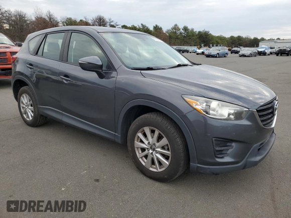 2016 Mazda CX-5 Sport with VIN JM3KE2BE8G0761648, listed as a Copart auction lot 81750854 with 191,384 mi miles and Clean Title. Bid and sale history available at DreamBid. Image 4.